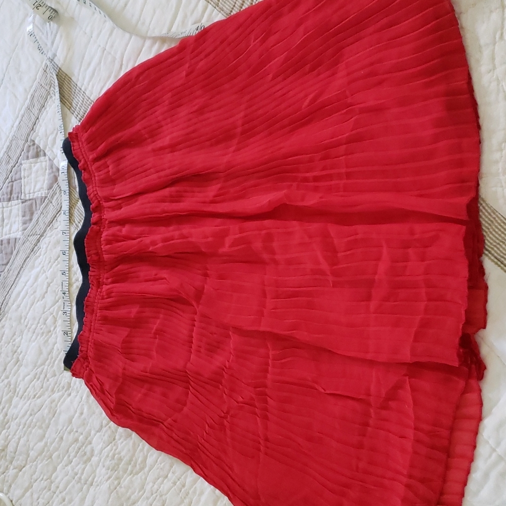 Like new pleated skirt. Waist stretches to 17"